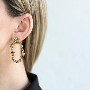 Mature, gold earrings
