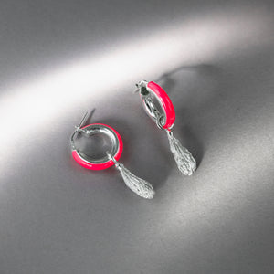 Round neon pink earrings