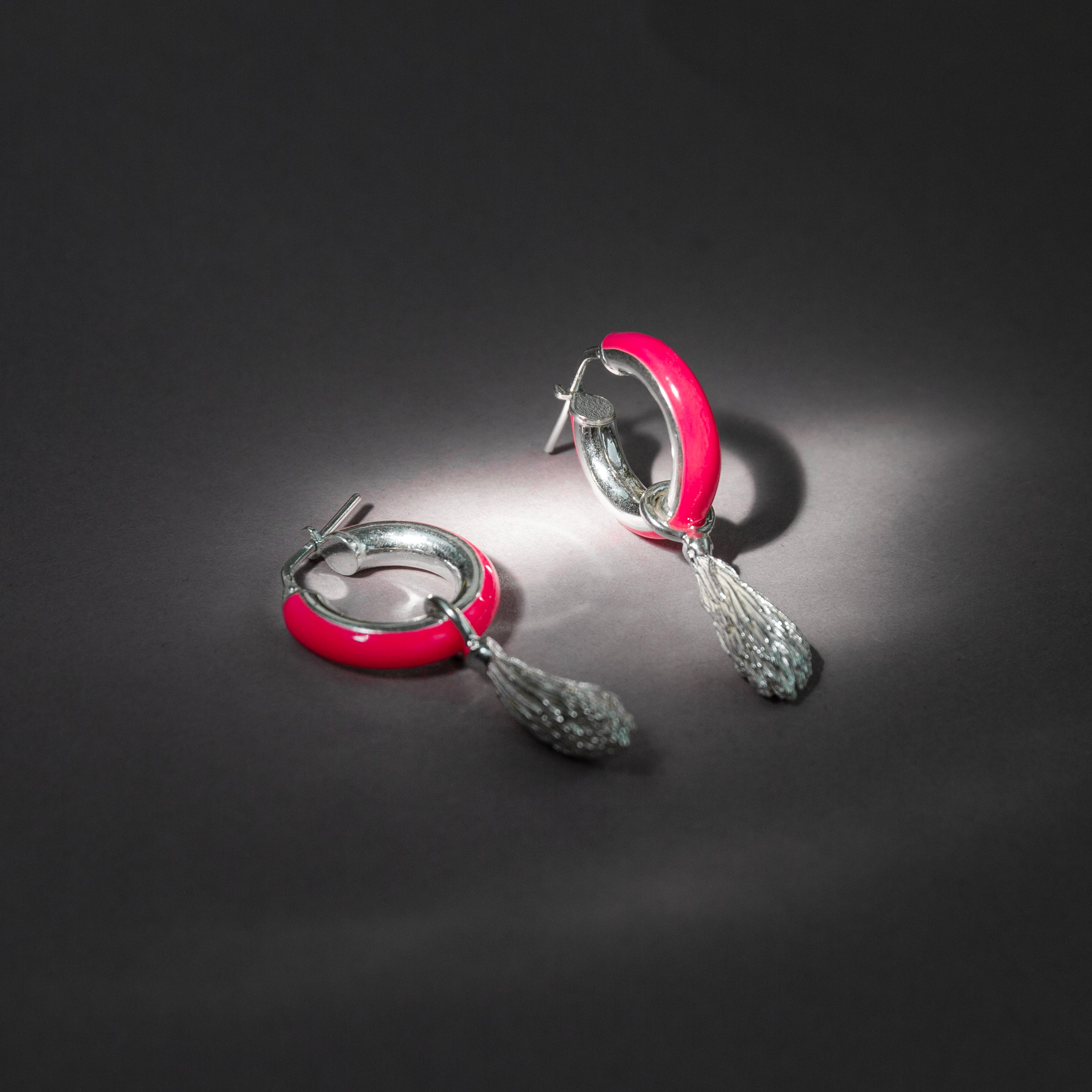 Round neon pink earrings