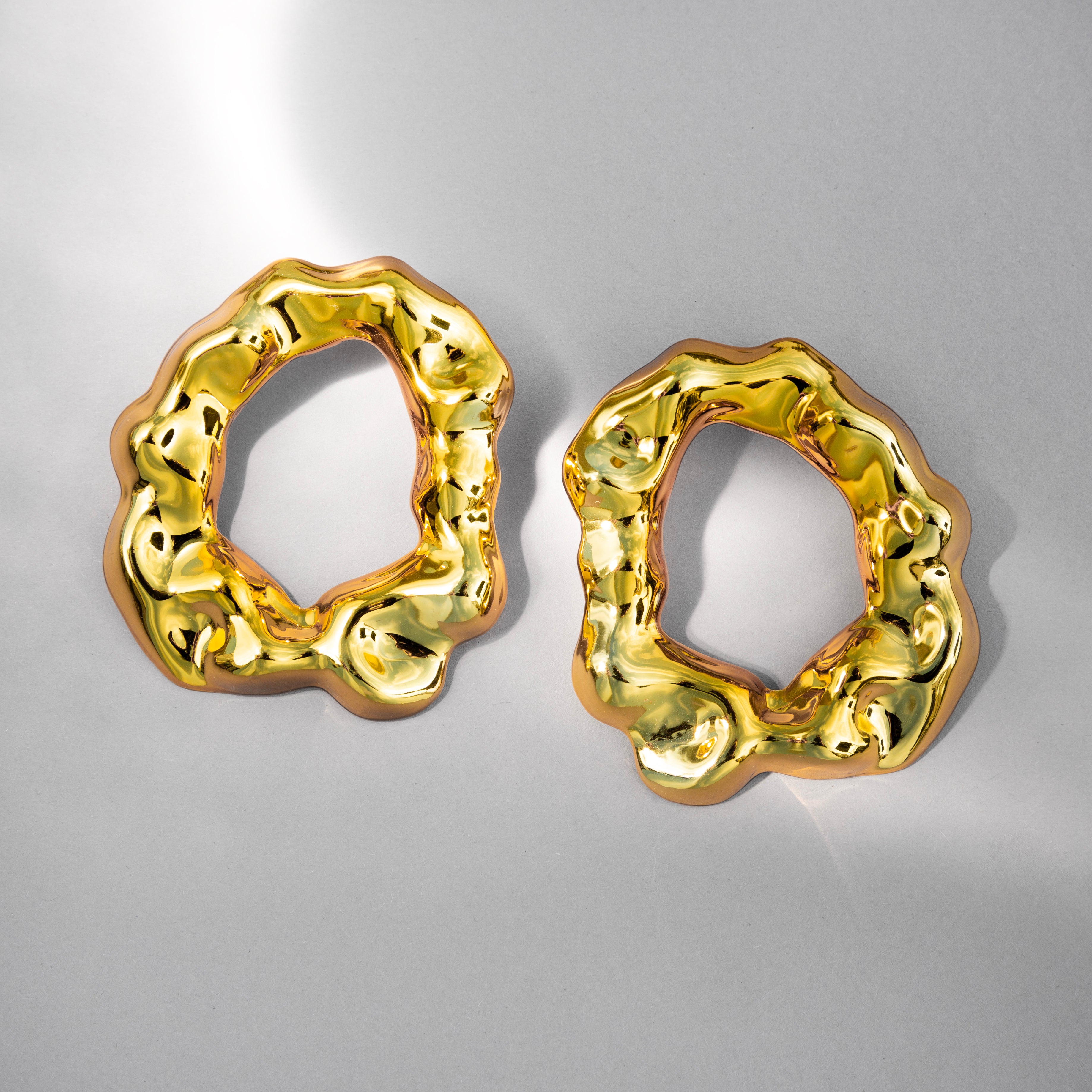 ENNE HAUTE round gold earrings