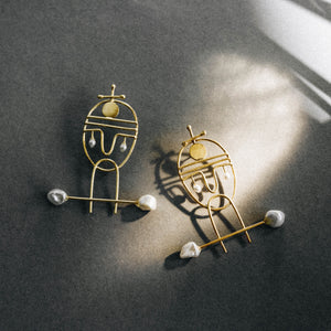 Portraiture, gold earrings