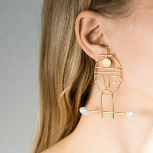 Portraiture, gold earrings