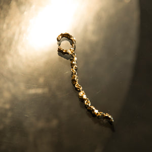 Stem, gold ear cuff