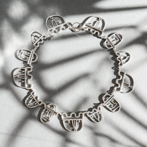Story, silver necklace