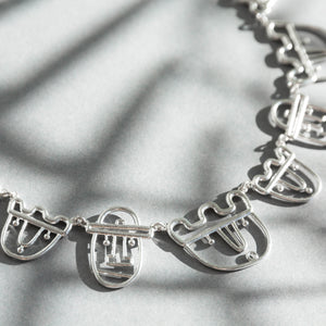Story, silver necklace