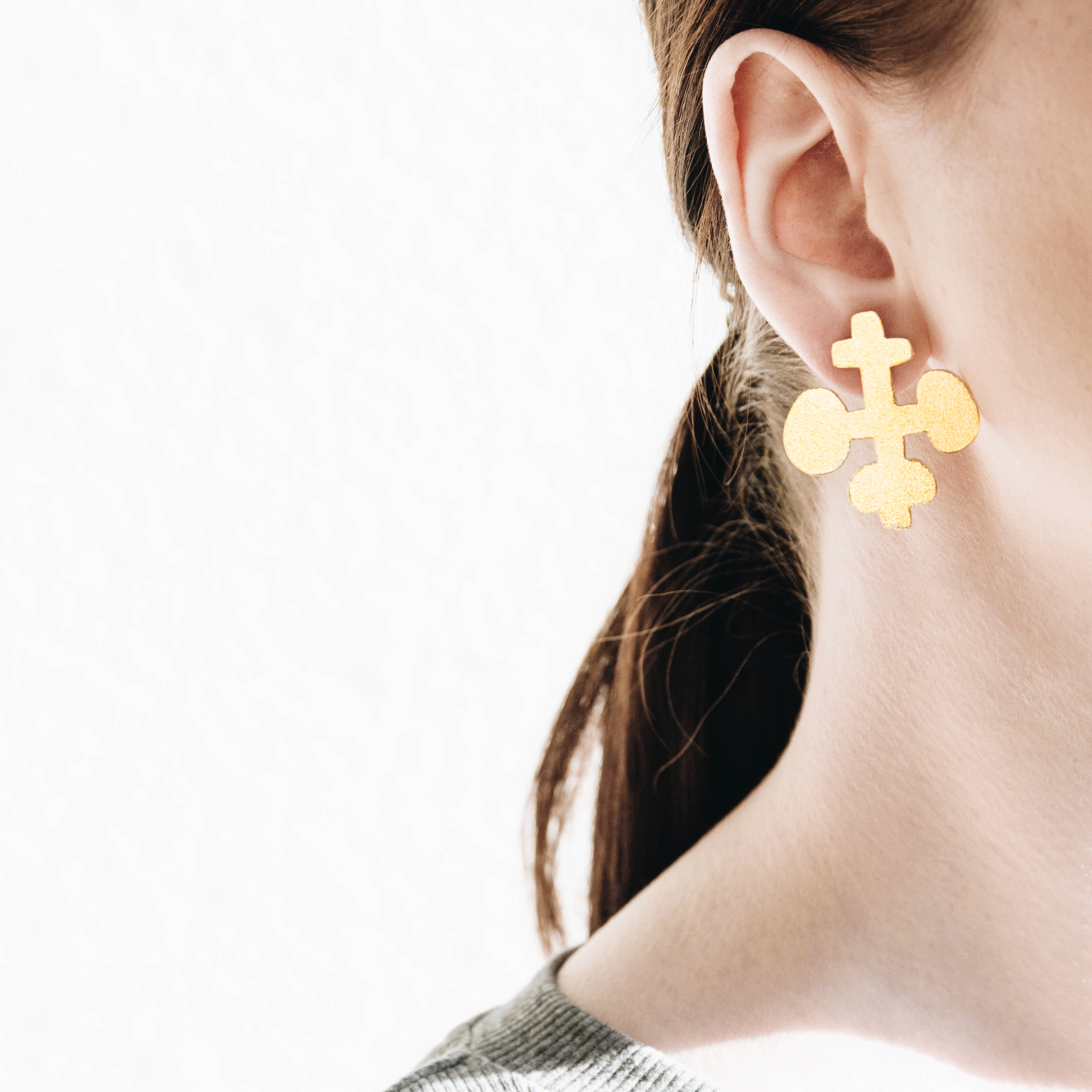 Collage, gold earrings