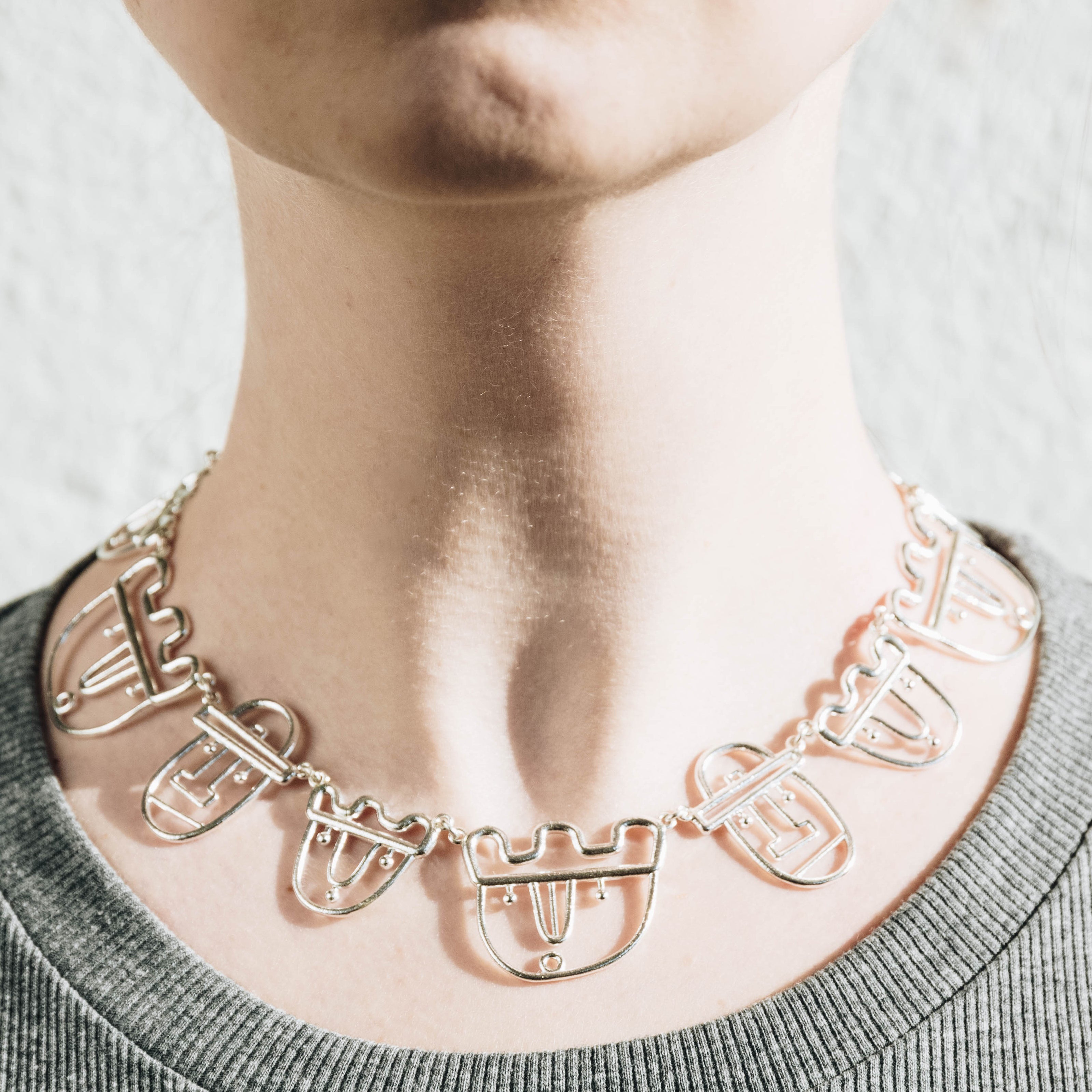 Story, silver necklace