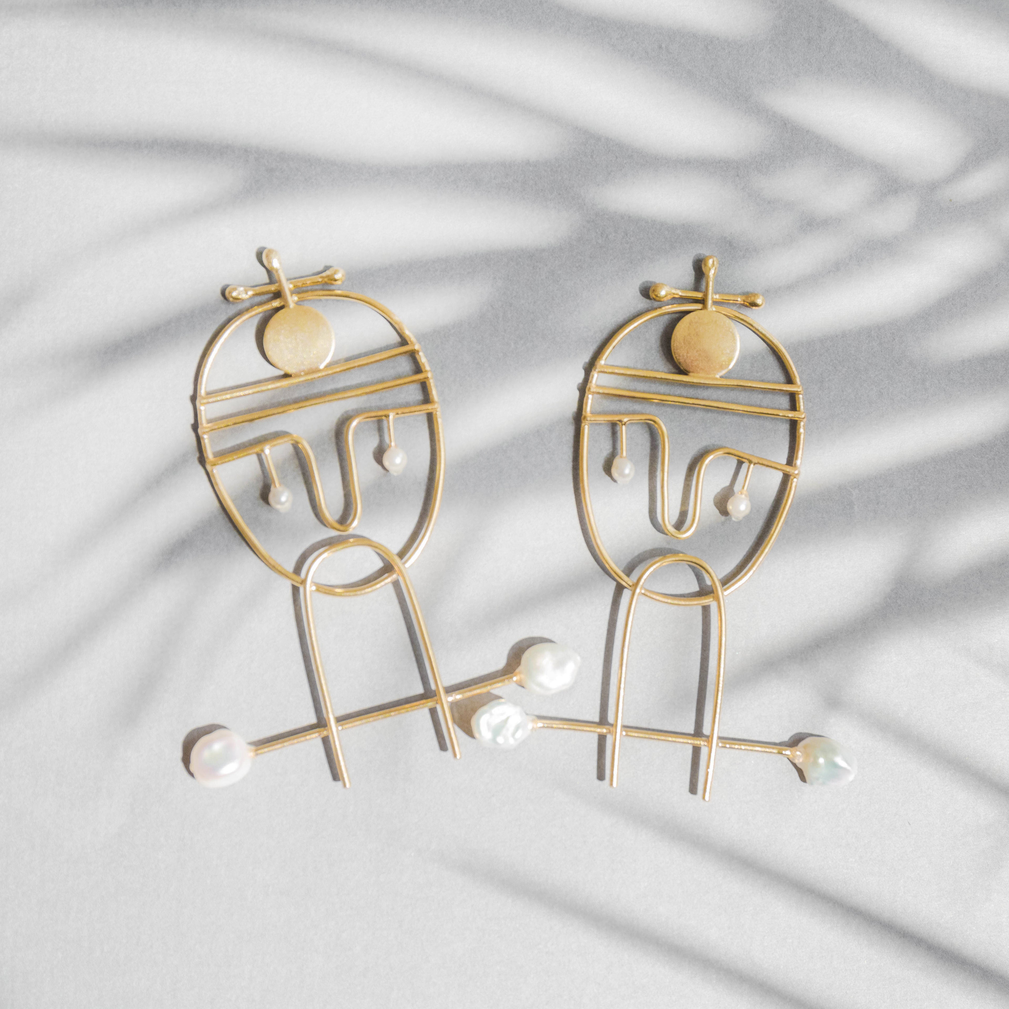 Portraiture, gold earrings